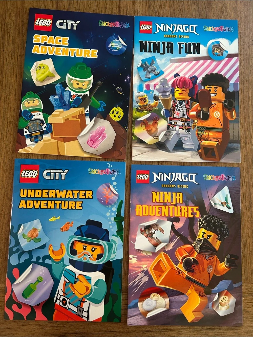 🆕 Lego City & Lego Ninjago Sticker Activity Books - set includes all 4! 🪐🥷🐠